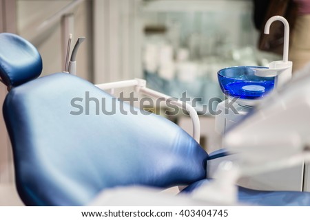 New dentist chair Royalty-Free Stock Photo #403404745