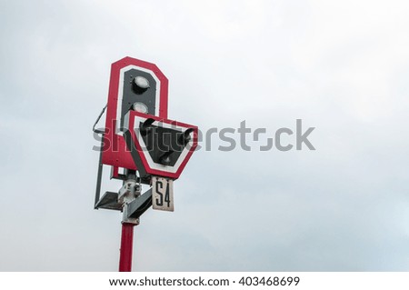 Close up photo traffic light poles with space sky and raincloud background