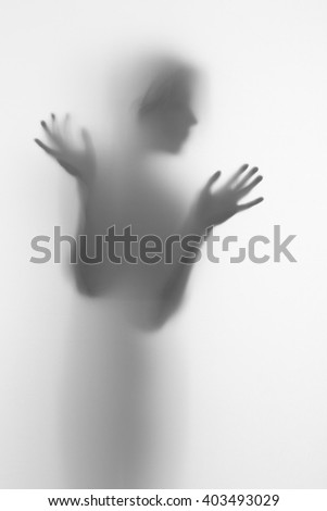 Silhouette of a female face and hands, fingers