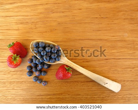 Berries such as blueberries and strawberries are among the most potent antioxidants. Healthy and organic food styling.