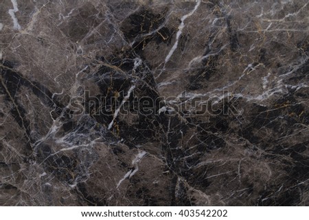 Marble Brown Fantasy rich dark brown excised bright graphic strokes, interspersed with different thicknesses. Durable building materials for interior decoration.