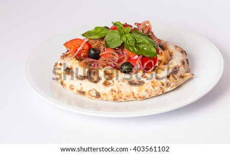 pita with vegetables Royalty-Free Stock Photo #403561102