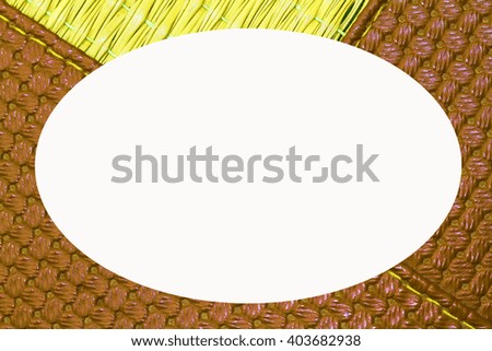 Gold picture frame on woven mats