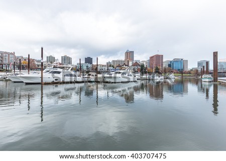 luxury yachts on tranquil water with cityscape and skyline in portland 