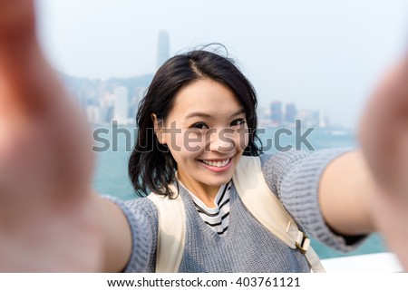 Woman take selfie image in Hong Kong