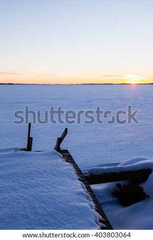 Winter lake with wharf