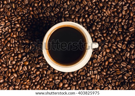 Coffee Beans And Cup Background.