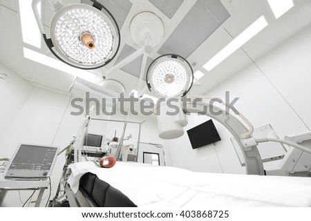 equipment and medical devices in modern operating room take with selective color technique and art lighting