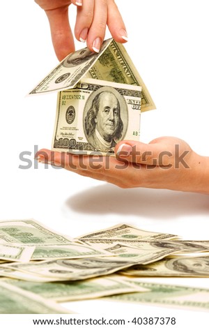 woman's hands holding a house isolated on white