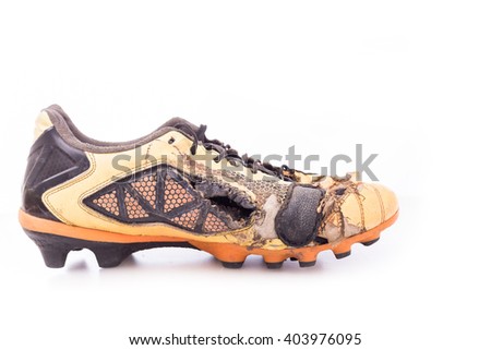 Old football shoes isolated on white background