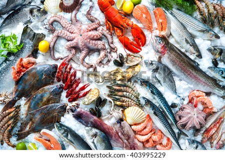 Seafood on ice at the fish market Royalty-Free Stock Photo #403995229
