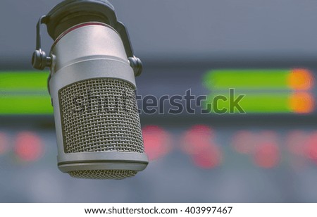 for radio stations: a microphone and an audio console