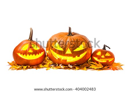 Halloween pumpkin head jack lantern with burning candles isolated on white background Royalty-Free Stock Photo #404002483