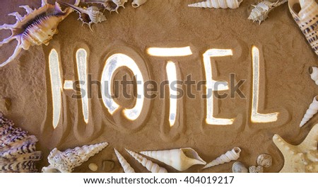 Hotel in the Sand. Beach background. Wellness. Beauty relaxation concept: Hotel icon is Highlighted by Rays of Light. Beautiful Romantic Sandy Background. Sea Leisure