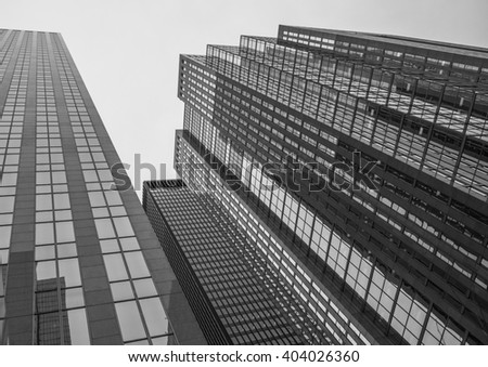 Looking up at office towers in in the downtown of Toronto Canada. A black and white image.
