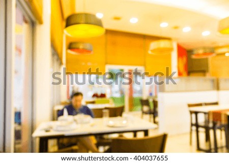 Blur image inside restaurant use for background.