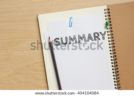 Text Summary on white paper and pencil on the desk / top view / business concept Royalty-Free Stock Photo #404104084