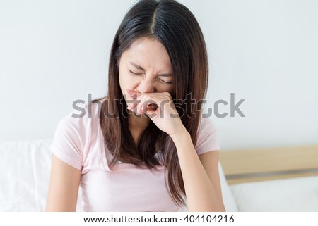 Woman with nose allergy Royalty-Free Stock Photo #404104216