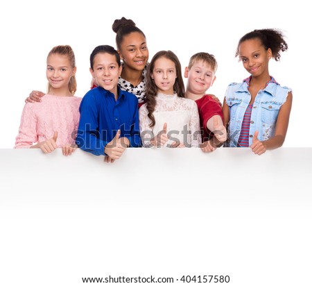 joyful kids with thumbs up holding an empty blank