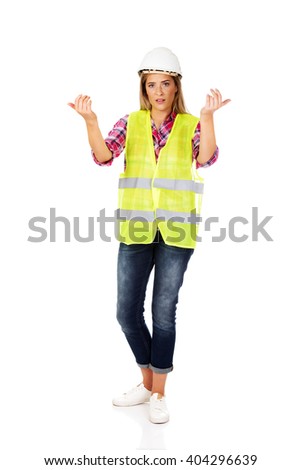 Female builder making do not know sign