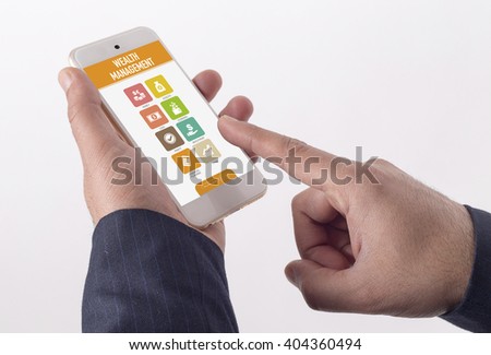 Man showing smartphone Wealth Management on screen