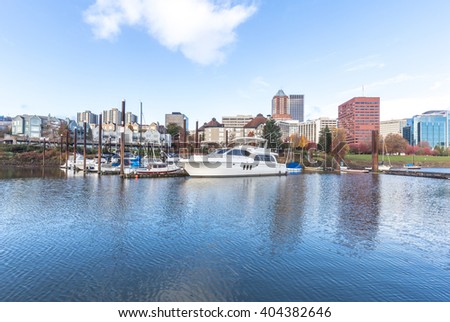 luxury yachts on tranquil water with cityscape and skyline in portland 