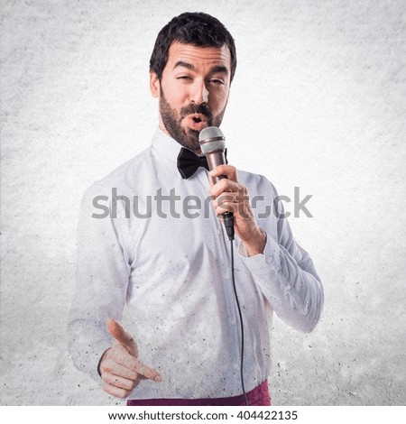 Waiter singing with microphone