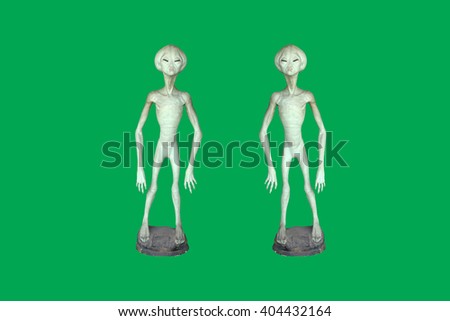 Toy model cartoon alien on green