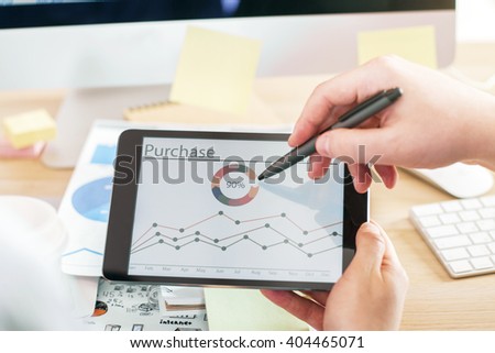 Two businesspeople discussing business scheme on tablet