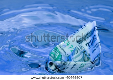 Ship with Dollar in blue water