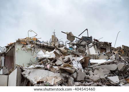 The remains of the destroyed building Royalty-Free Stock Photo #404541460