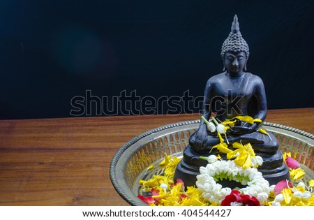 Buddha statue water ceremony in Songkran Festival Unseen Thailand 