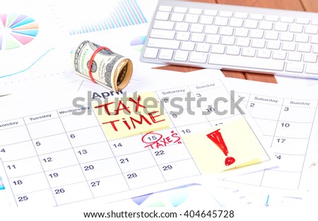 Taxes. Tax Day - April, 15. Concept for tax day or april 15 the national deadline for filing taxes