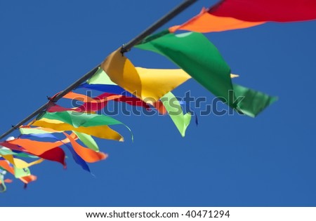 Small triangular waving flags.