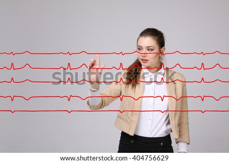 Doctor woman working with cardiogram lines