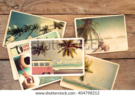 Summer photo album of remembrance and nostalgia  on wood table. instant photo of retro camera - vintage effect filter style