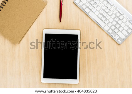 Office table top view with tablet and pc and notebook