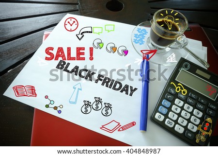 drawing icon cartoon with BLACK FRIDAY concept on paper in the office , business concept 