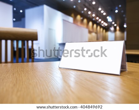 Mock up Blank sign on desk Event Hall Background