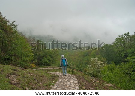 Man walking in the park of Kutaisi, Georgia
