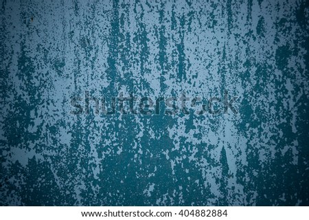Old wall with flaking paint and fallen away. Picture with vignette. It can be used as texture or the background
