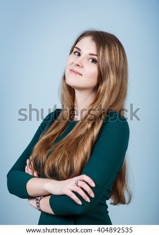 Young woman with crossed hands