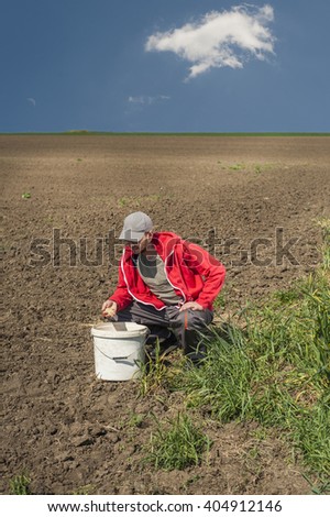Planting soybean on field