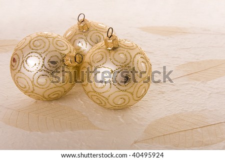 Christmas decoration: Three elegant golden baubles