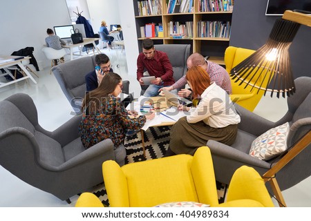 group of young business people , Startup entrepreneurs working on their venture in coworking space Royalty-Free Stock Photo #404989834