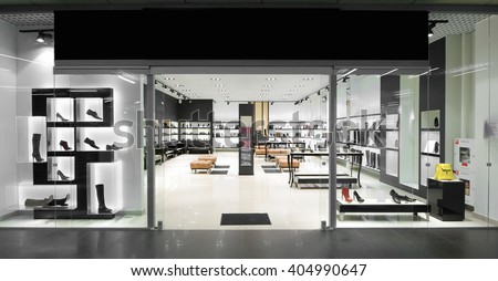 bright and fashionable window of modern European store Royalty-Free Stock Photo #404990647