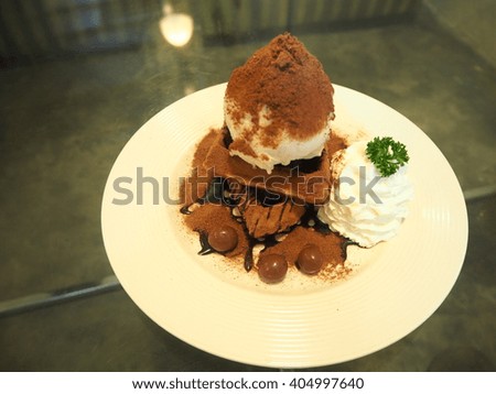 Waffle with ice cream and whipping cream