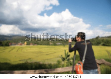 photographers holding camera. blurred blur