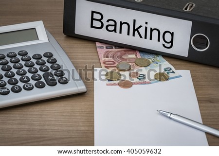 Banking written on a binder on a desk with euro money calculator blank sheet and pen