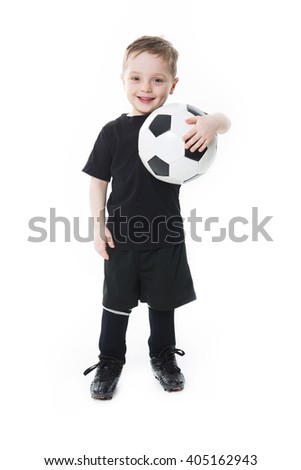 A Cute boy is holding a football ball isolated on a white background. Soccer 